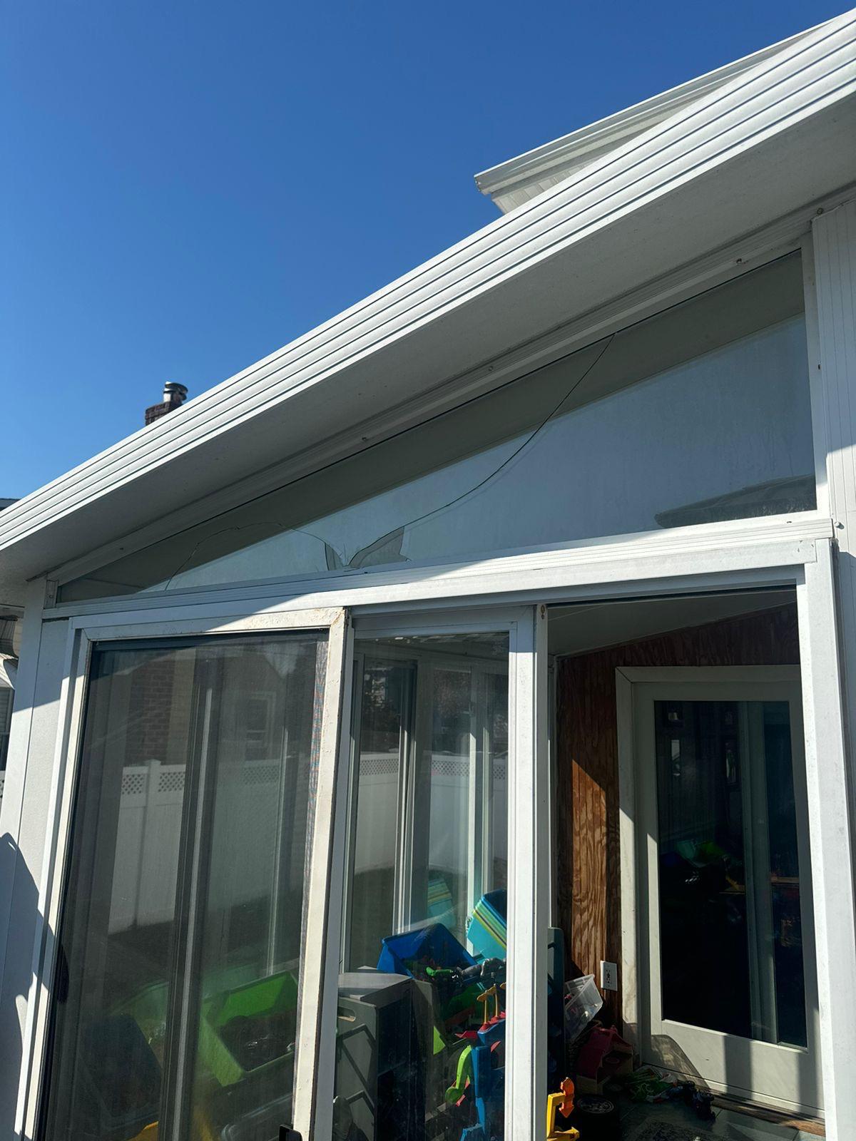 Broken glass before replacement second example